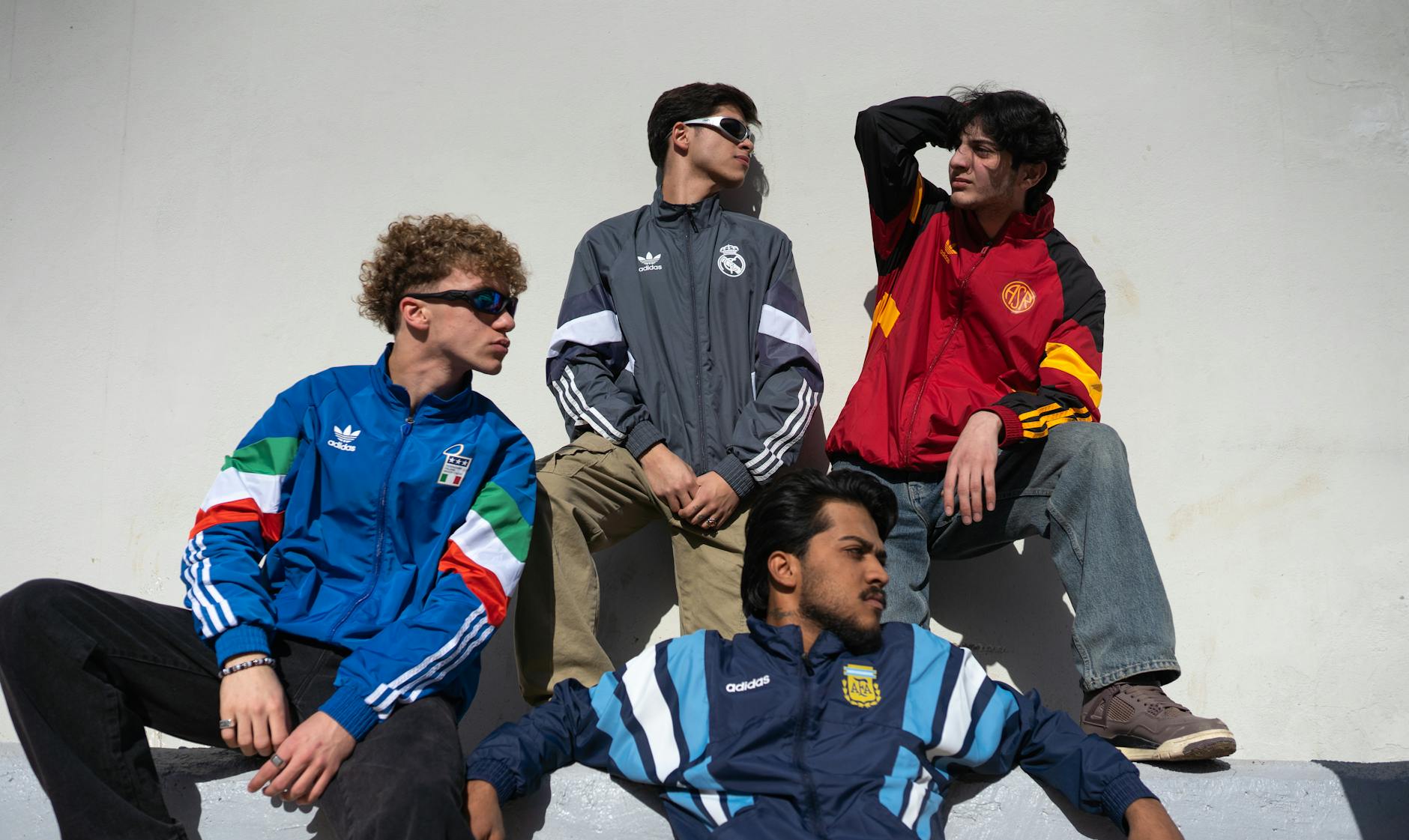 group of friends in stylish sports jackets outdoors